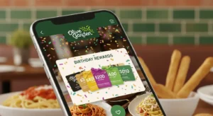 Smartphone displaying the Olive Garden app with birthday rewards and festive confetti